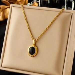 Elegant Gold and Black Pendant Necklace